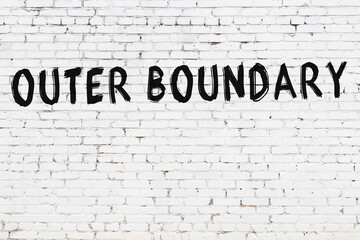 Inscription outer boundary painted on white brick wall