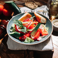 Fresh salad with tomatoes cucumbers sweet pepper