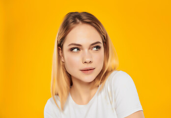 Fototapeta premium pretty woman in a white attractive look happy Lifestyle yellow background