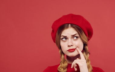 beautiful woman in a red sweater cosmetics emotion isolated background