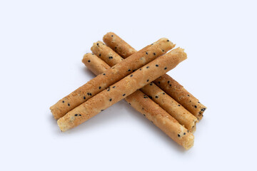 Crispy egg rolls on white background.