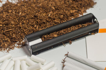 Dried tobacco leaves are mainly used for smoking in cigarettes and cigars, as well...