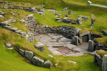 Stone Age smithy ruins at the Jarlshof Prehistoric and Norse settlement in the Shetland Islands,...