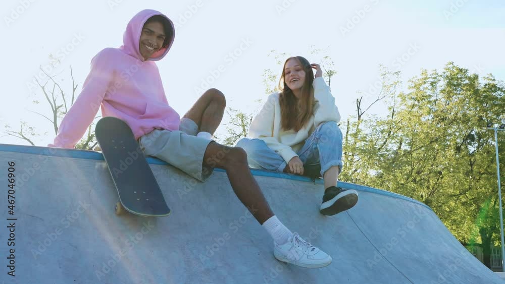 Wall mural Group of teens having fun outdoor