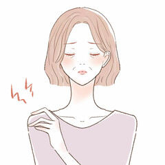 肩こりに悩まされる中年女性