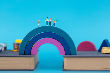 Rainbow bridge between books and elementary school students go to school