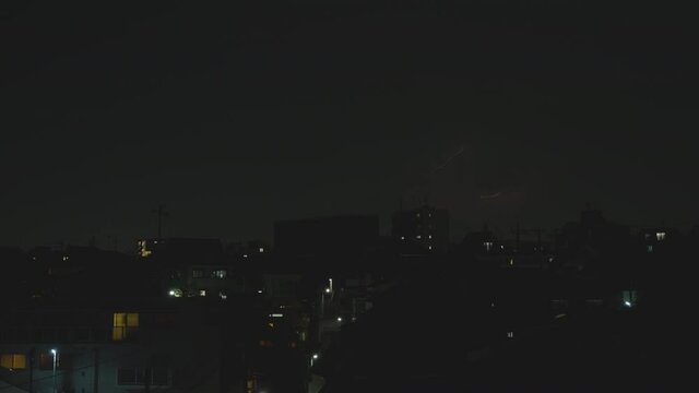 Lightning And Thunder Flashes Over City Skyline On Twilight In Tokyo, Japan. Static