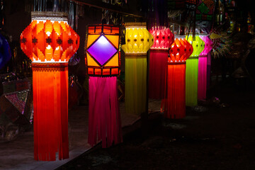 Vibrant colored tradition shaped lanterns called "Aakash Kandils" displayed during Diwali celebration in Pune, India.