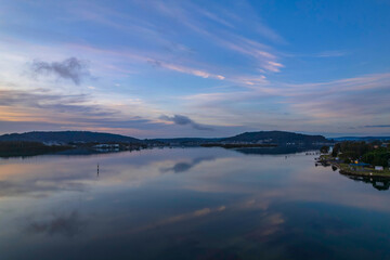 Sunrise and cloud reflections waterscape