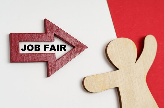 On a red-white surface, a human figure and an arrow with the inscription - JOB FAIR
