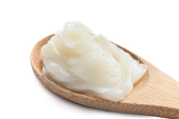 Spoon with lard on white background