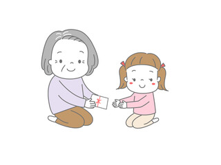 孫にお年玉を渡しているおばあちゃん