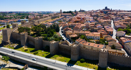 Aerial view of imposing stone defensive walls around historic Spanish city of Avila