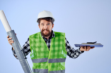 Obraz premium male worker in a white helmet blueprints Professional studio industry