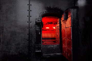 Ancient black firing  industrial furnace.