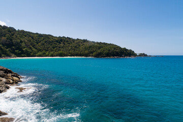 Amazing Aerial view of sea waves hitting rocks with turquoise sea water Beautiful seascape in the Phuket island coastline