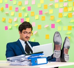 Businessman having trouble with his priorities