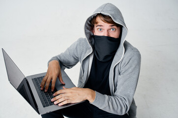 masked man crime anonymity caution balaclava isolated background