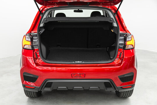 Clean, open empty trunk in the red car SUV.