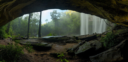 Beautiful cave and waterfalls in the deep forest.
