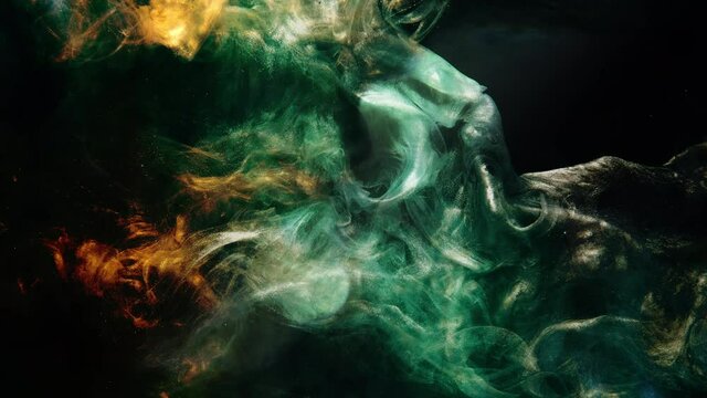 Ink water flow. Glowing fluid. Underwater splash. Abyss void. Green golden silver glitter dust particles smoke cloud animation on dark black abstract background logo reveal.