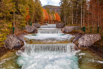 Fototapeta premium waterfall in autumn at lake Walchensee in Germany