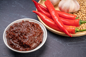 Korean spicy dipping sauce or Ssam Jang, Korean Mixed seasoning with red chili powder, garlic and soybean. - obrazy, fototapety, plakaty