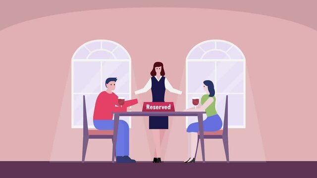 Young couple sits on reserved table in restaurant