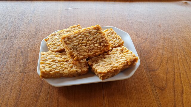 Fried Tempeh On A Square Plate