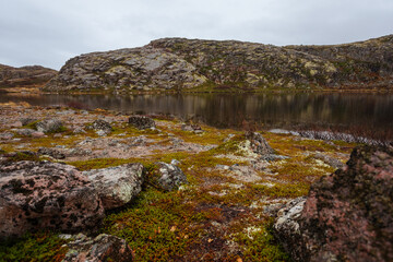 Mountain lake in the vicinity of Teriberka at sunrise