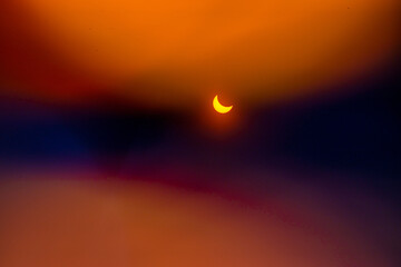 Partial solar eclipse. Silver of sunshine before totality.