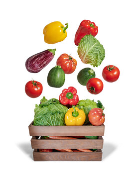 Vegetables Flying In Wooden Box Isolated From The Background