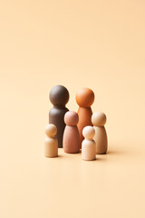 Children figurines near heterosexual parents