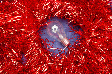 Clear glass incandescent filament bulb, analog technology