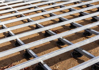 Steel beams for fixing wooden floors