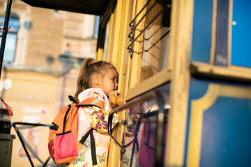 child playing with a train