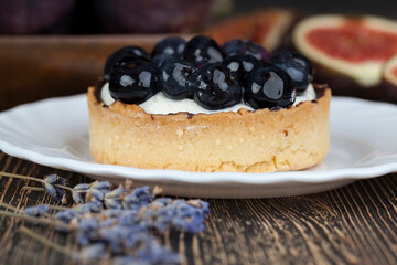 tartlet with cream and blueberries