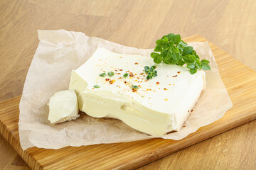 Greek Feta cheese over board