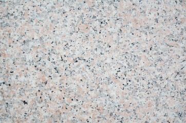 Granite stone texture background. Nature backdrop with a close-up on luxury stone grain pattern.