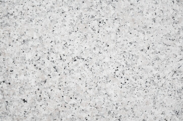 Granite stone texture background. Nature backdrop with a close-up on luxury stone grain pattern.
