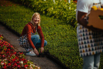 Fototapeta premium Young florist couple at work