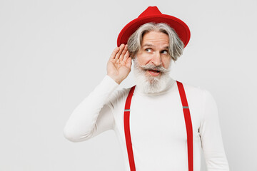 Elderly gray-haired mustache bearded man 50s in turtleneck red hat suspenders try to hear you...