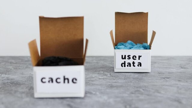 online privacy and stored information, metaphor of open boxes with User data and Cache labels next to each other