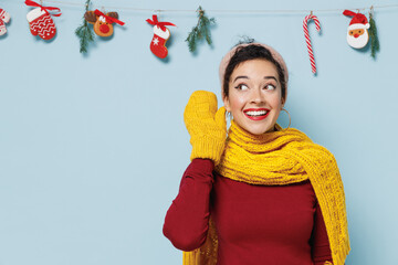 Curious nosy young woman 20s wear yellow mittens scarf sweater try to hear you overhear isolated on...
