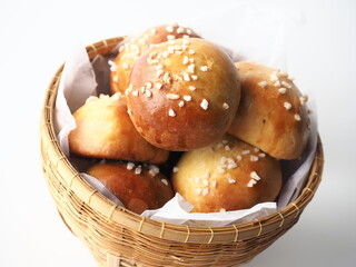 brioche bread bun in wicker basket