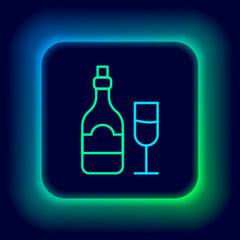 Glowing neon line Champagne bottle with glass icon isolated on black background. Colorful outline concept. Vector