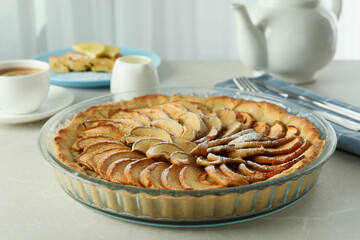 Concept of tasty food with apple pie on textured table
