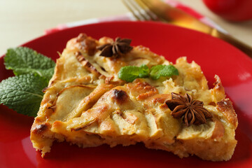 Concept of tasty food with apple pie on wooden background