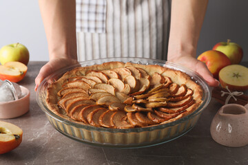 Concept of cooking apple pie on light background