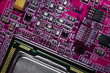 Close-up of a red electronic printed circuit board (PCB) with semiconductor strips between a microchip, transistor, and electronic equipment processor. IT technologies in programming, background